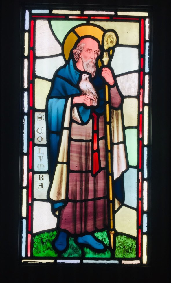 The Cathach is traditionally ascribed to Colm Cille (St Columba). Colm Cille was born at Gartan, Co. Donegal, 7 December 521 and founded the monasteries at Durrow, Kilmore and Iona. Image: Stained glass window at Castell Coch, South Wales.