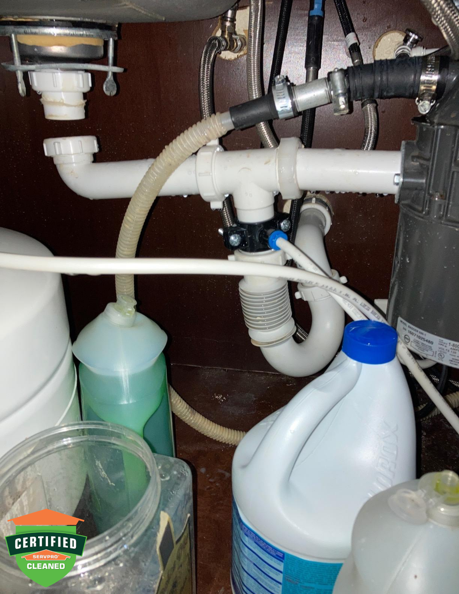 ServproWhittier's tweet photo. Water damage affects multiple rooms throughout the residence. The cause of the damage was a break in the supply line under the kitchen sink. https://t.co/fNCNvbpLAP