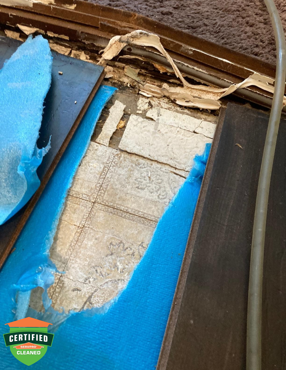 Water damage affects multiple rooms throughout the residence. The cause of the damage was a break in the supply line under the kitchen sink.
