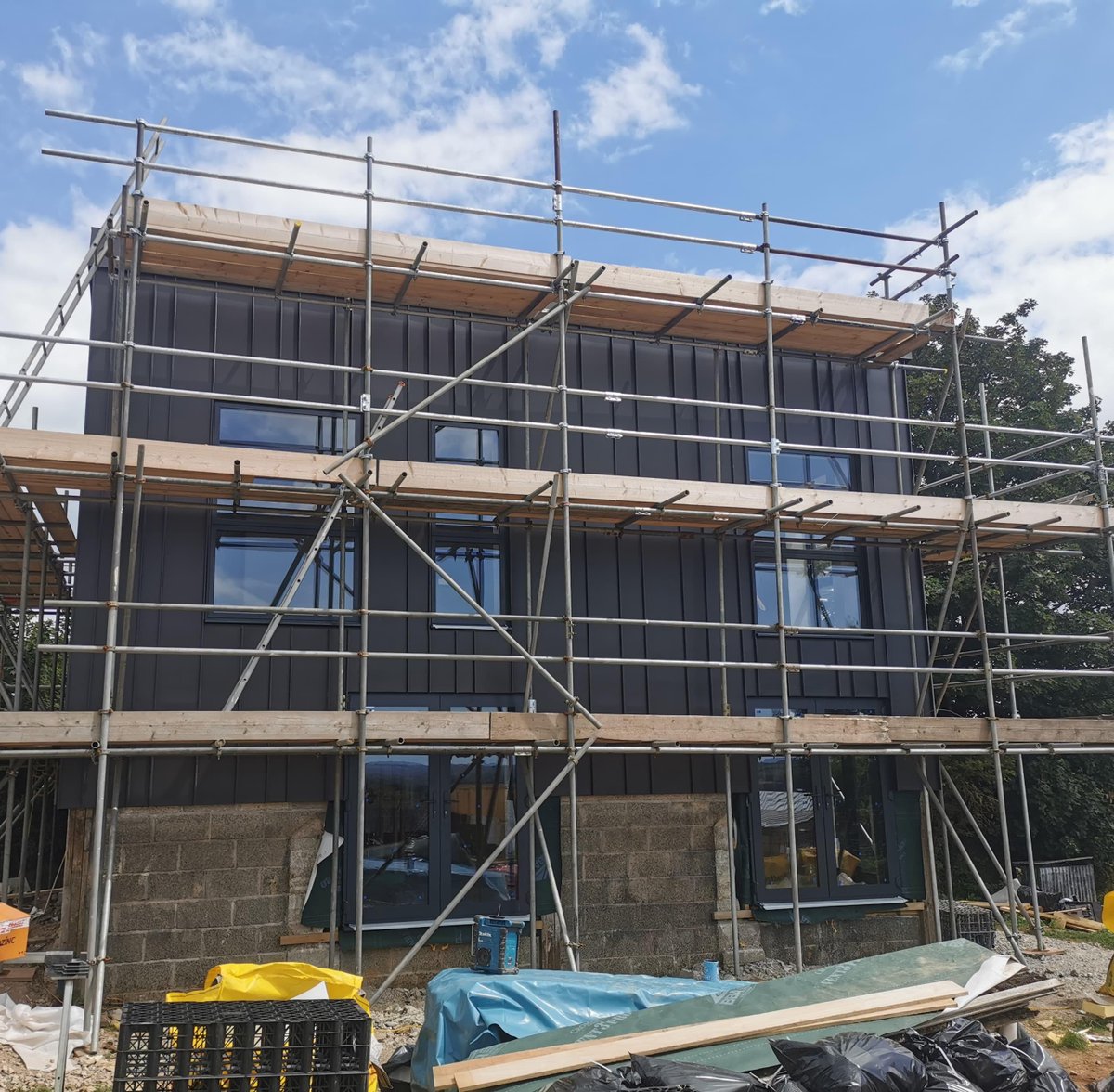 Can't wait to see the scaffolding dropped on this one. 
Random sized panels were chosen on this design using VMzinc Anthra.