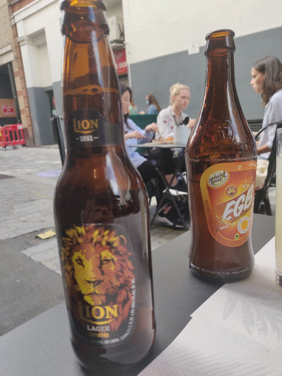 Sri Lankan food @ KolambaYou know it's a good Sri Lankan meal of it starts with Lion beer and short eats and ends with Kiri Pani (yogurt with kitul treacle). Also on the table - yellow monkfish curry, polos (jackfruit) curry, gottukola sambol and rice.  #EatOutToHelpOut