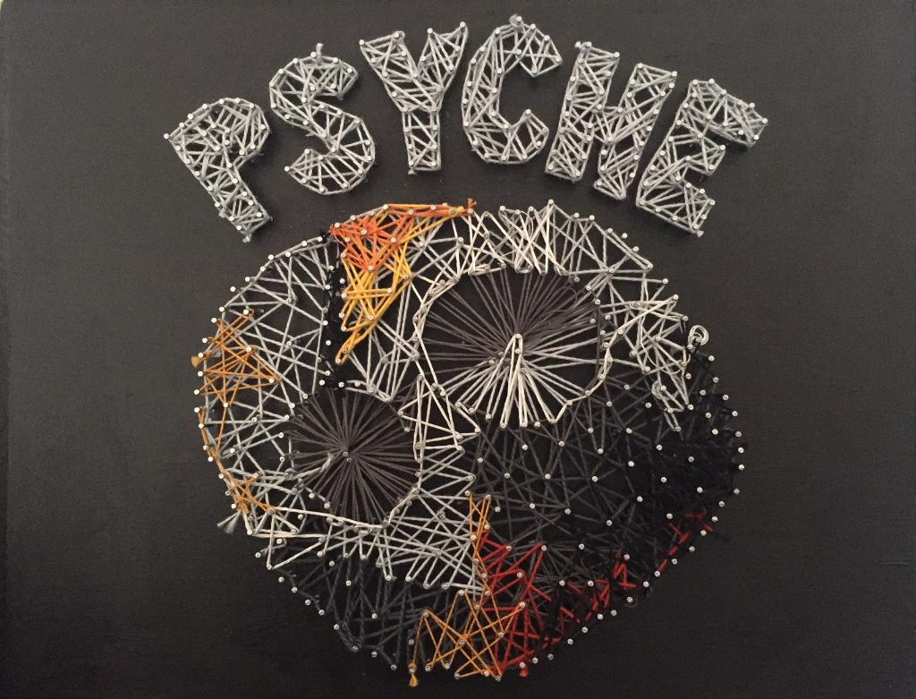 "Psyche String Theory" by Angela Wroblewski. Shows asteroid made of string and mission name written in string.