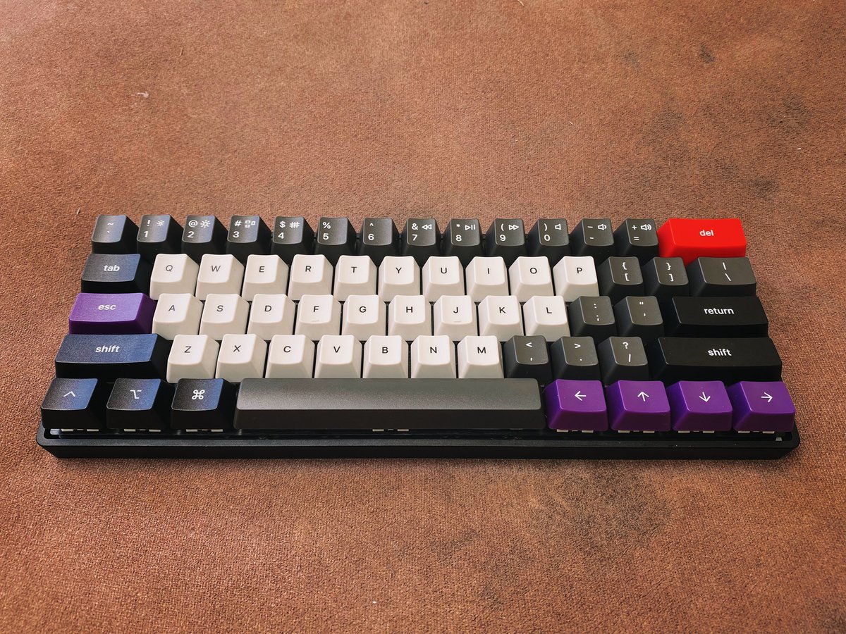 Here’s a photo of v1. Custom designed some keycaps which I ordered from  @wasdkeyboards, Kaihl Speed switches (copper, spent hours lubing them, they feel/sound amazing), DZ60 PCB, low profile  @KBDfans case, and some recycled packaging foam for sound isolation.