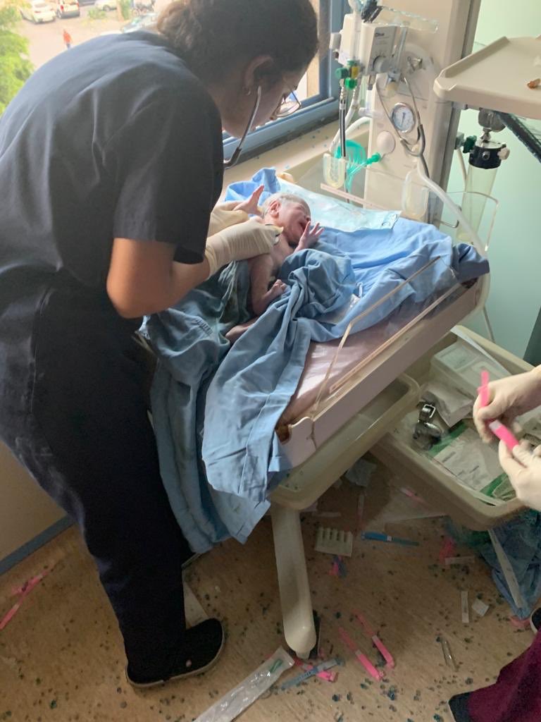 George and his family survived and are now resting and recovering. They have praised doctors and nurses like Marie, who stayed calm and helped deliver their baby when all of the equipment had been obliterated.