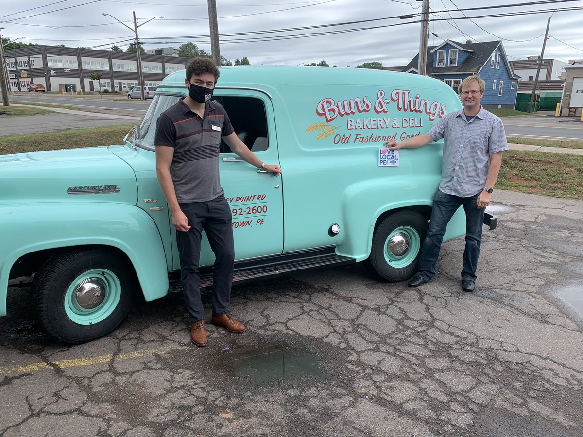 TheHOT1055's tweet photo. Itβs @ChtownChamber day!! Alex and I visited Bill at Buns and Things this morning. Have you seen this car before? What a classic!! And the sign behind me says it all, donβt forget your muffins π§ #LoveLocalPEI #ShopLocal #SupportPEI https://t.co/EagiNpqpkQ