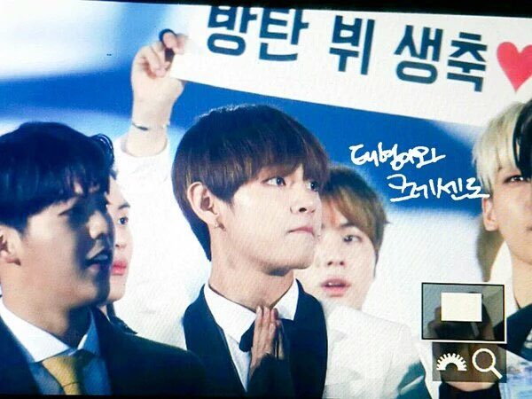 seokjin holding “bangtan v happy birthday” banner everywhere yeah hes whipped