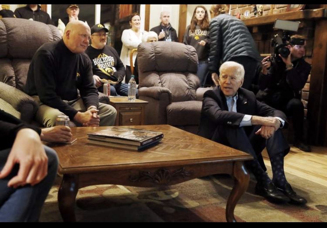 PhilipWegmann's tweet image. About that new Trump ad alleging that Biden is “Alone. Hiding. Diminished.” 

The clip at the four second mark is edited to make it look like he is sitting on the floor of his basement alone. 

But it’s from an Iowa event last December. The room was full. See below:
