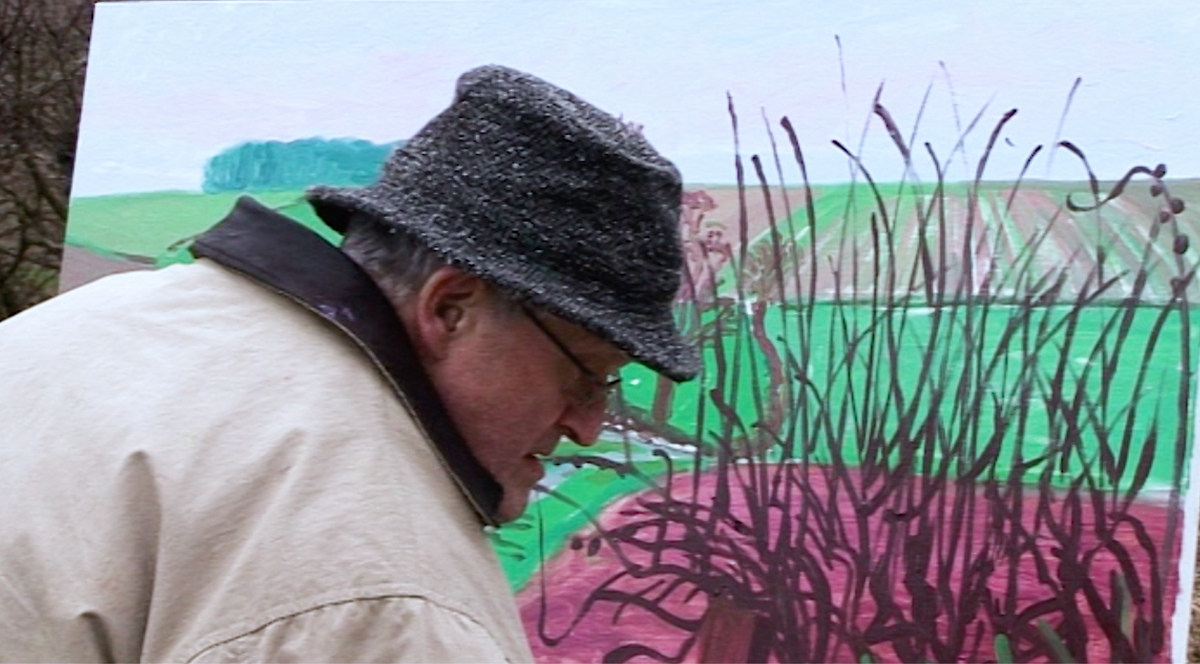HockneyUnlocked's tweet photo. In this final clip it was absolutely freezing! Hockney calls this painting Track and Hedgerow, January. We hope you’ve enjoyed these 80 short films. Please take a look at the full film on Vimeo and help support independent documentary making. https://t.co/HYkwymPBHC #DavidHockney https://t.co/MXP9jQX3xn