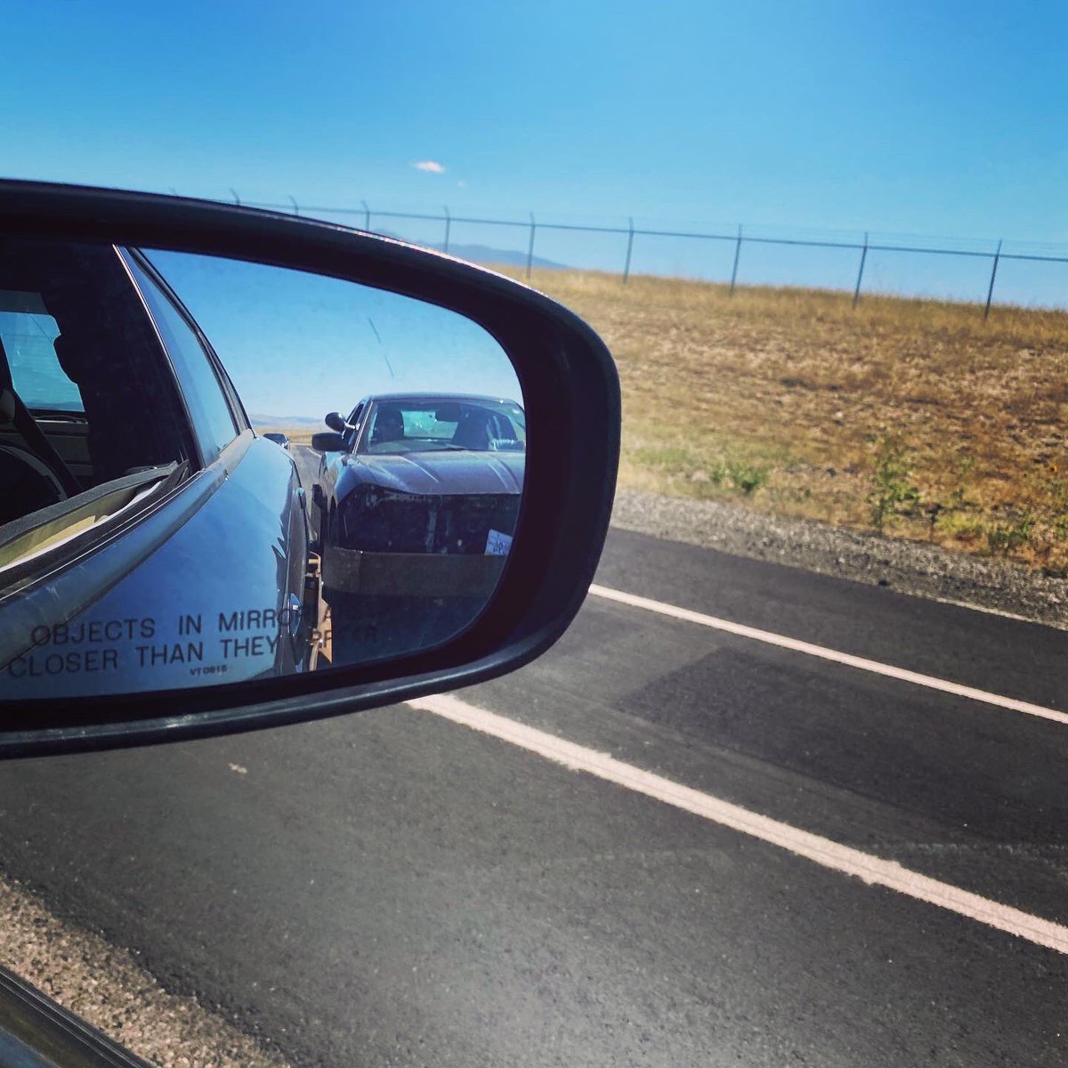 TrooperBragg's tweet photo. Objects in mirror are closer than they appear is an understatement!  Wish the car I was in today had A/C #trainingdays #spinningspinningspinning #donotrunfromthepolice https://t.co/Af6423zK2b