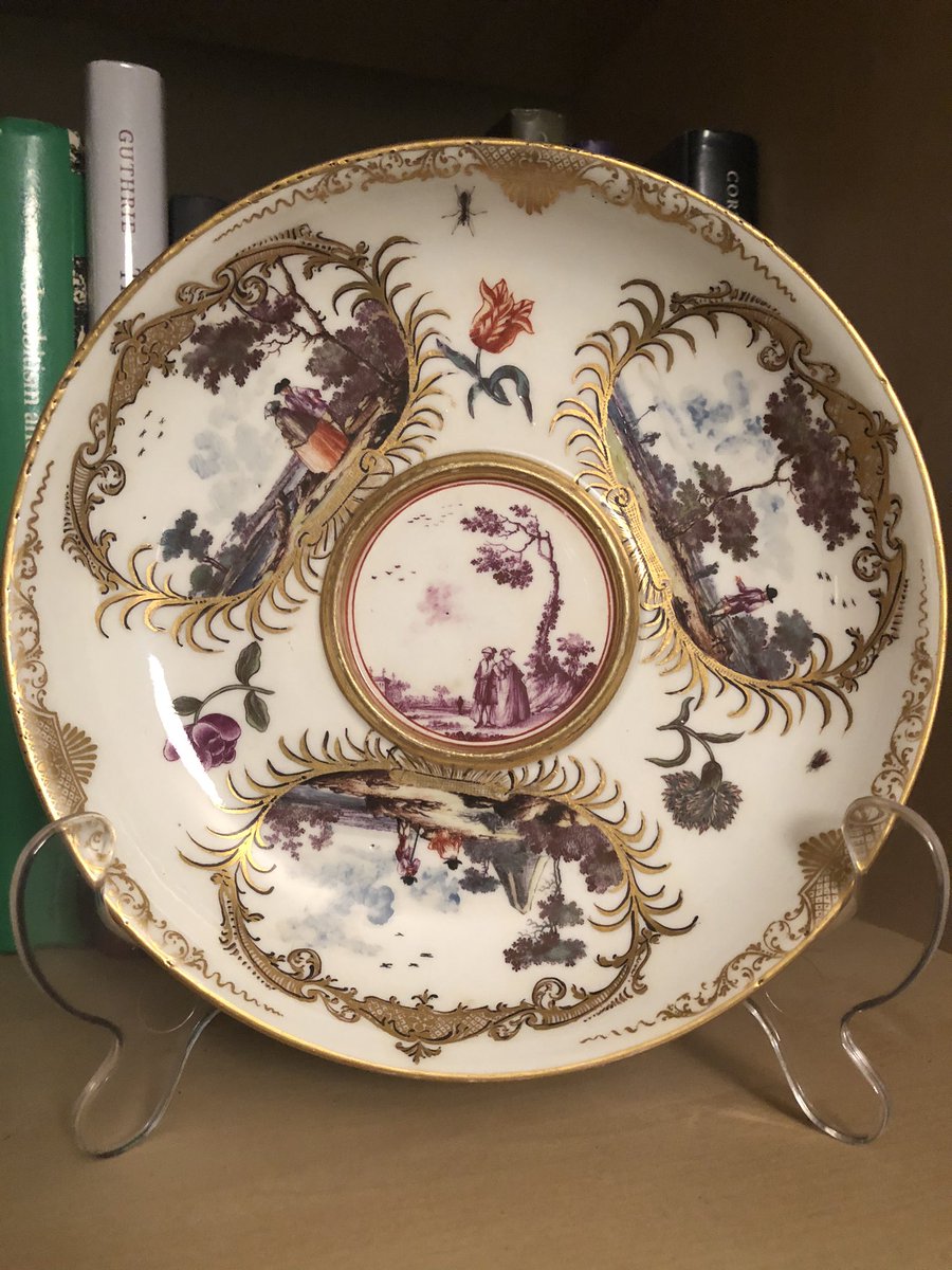 whitegoldsword's tweet photo. This is one of my favourite pieces of #Meissen porcelain. An #ecuelle stand decorated with 3 vignettes depicting staffage in harbour views, a central couple painted in puce, flowers and insects. I can only imagine what the pot was like. Top quality! https://t.co/tgW10Z9fZz