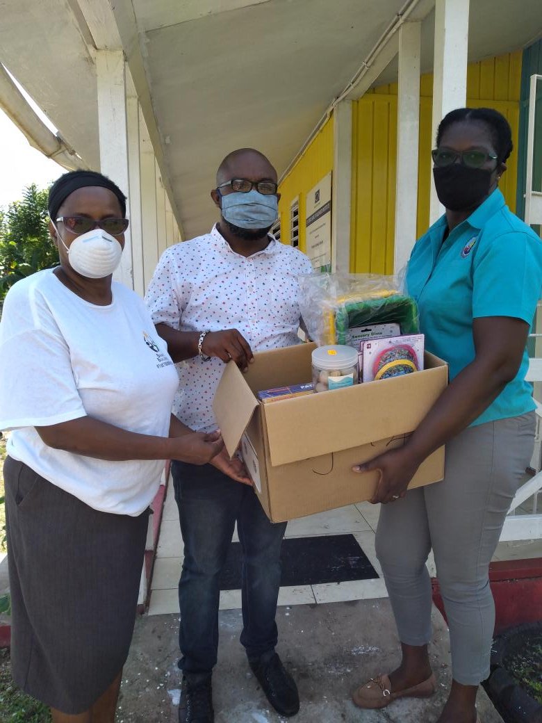 malcolm_karena's tweet photo. Handing over learning materials to Mr. Marlon McKenzie,  principal at Seaford Town Infant Department.  #12StandardsMatter @ECCJA https://t.co/d7KIV8JWdr