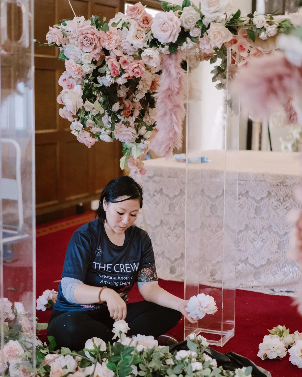 Working magic at syd_uni ✨🌸 One of the best things about this job is getting to create events with our amazing team. What you often don’t see is them pushing, lifting, hauling, styling, lighting and running around like headless chickens! #annawangstylist #sydneywedding #sydn