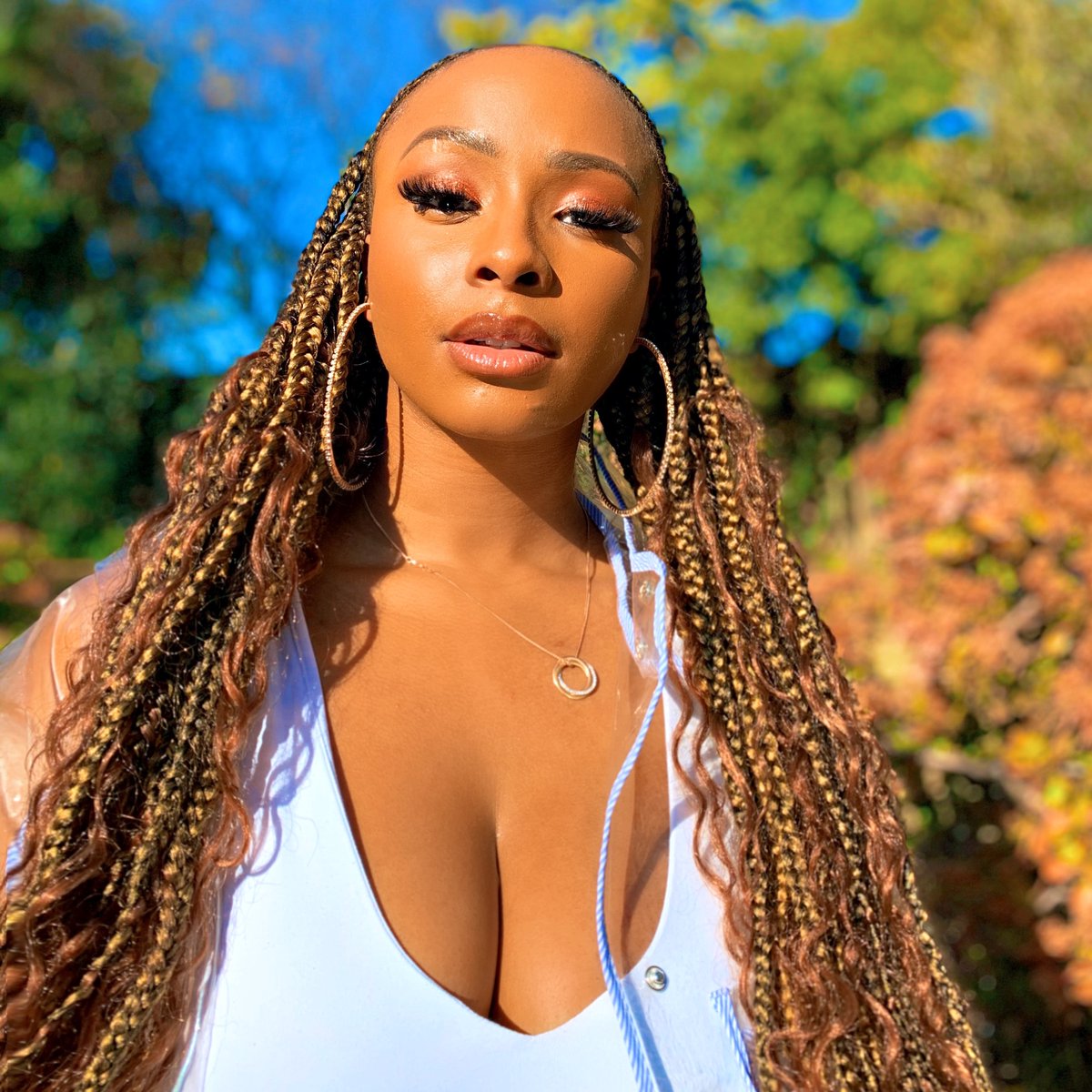 Boity's tweet image. Unbothered. 👑❤️