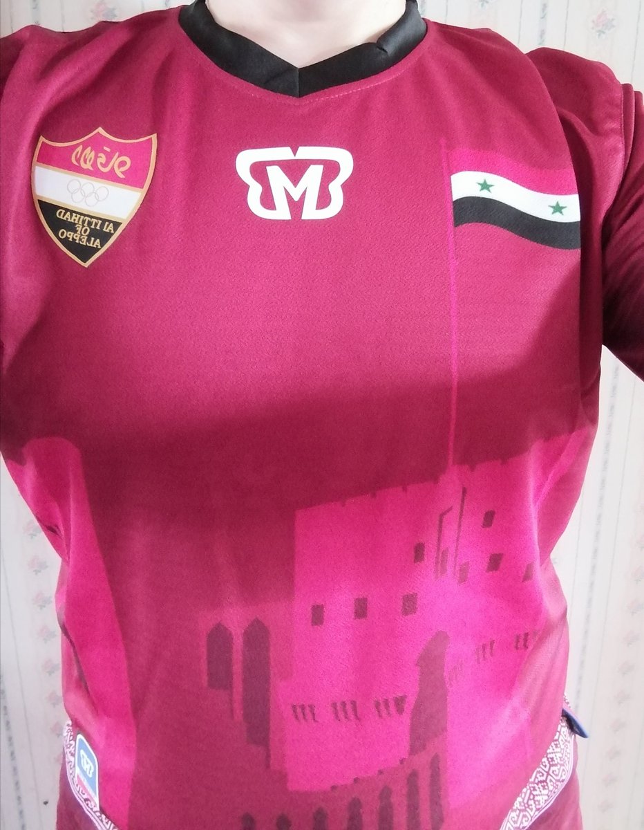 Really excited for today's #homeshirt - Al Ittihad of Aleppo. The shirt features Aleppo's iconic citadel and the Syrian flag flying above.  During the civil war militants occupied parts of Aleppo and banned football, the city was almost destroyed before they were driven out. 🇸🇾⚽