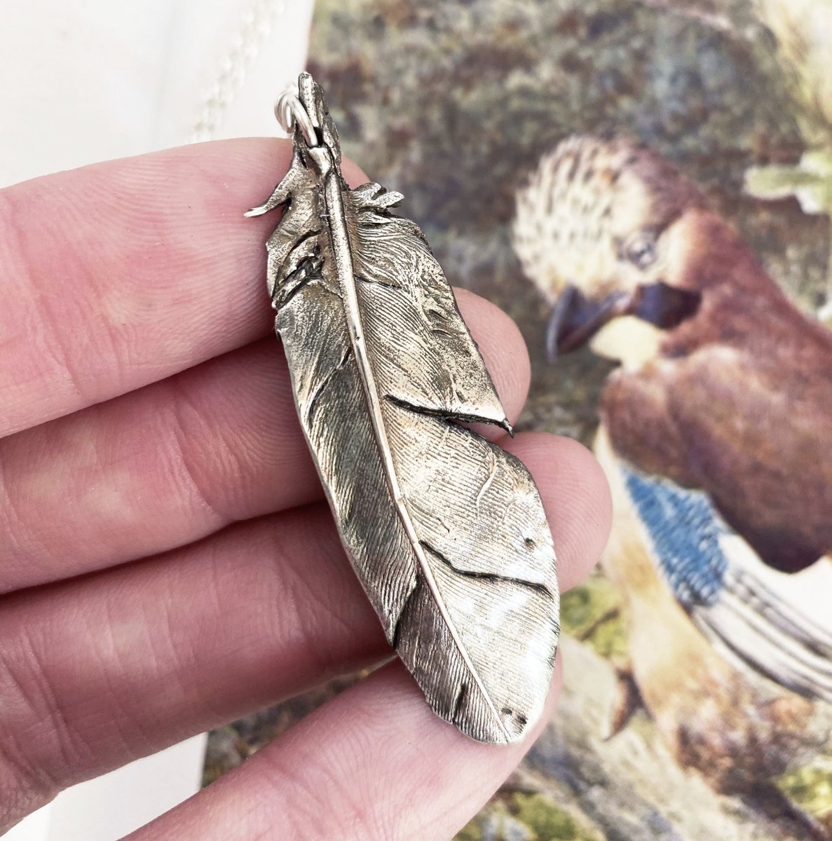 Am horribly nervous but my Etsy shop will open at 8.30pm UK time. 

When I have as many orders as I can make in a week I'll switch to holiday mode with a message about when I'll re-open (probably the end of next wk).

Feather pendant,made using a jay feather. 
Zoom in for detail.