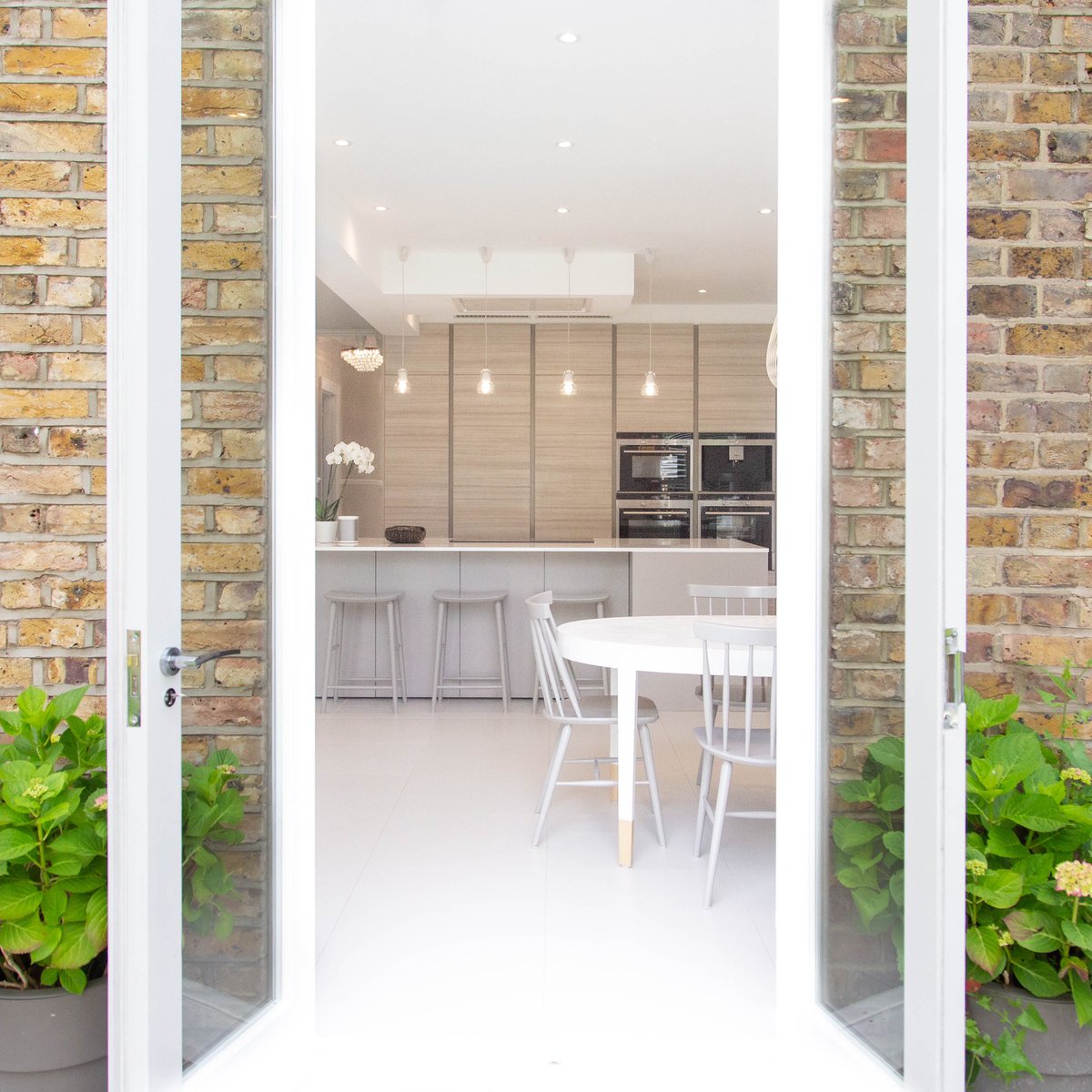 VogueKitchens's tweet photo. A gorgeous Scandinavian inspired kitchen - designed with soft neutral tones and wood doors for our client’s home 🤍

If you’re planning a kitchen visit https://t.co/edDK59XGJo for more information on our products and projects #luxurykitchen #luxuryhomes https://t.co/zRyyJUV8dP