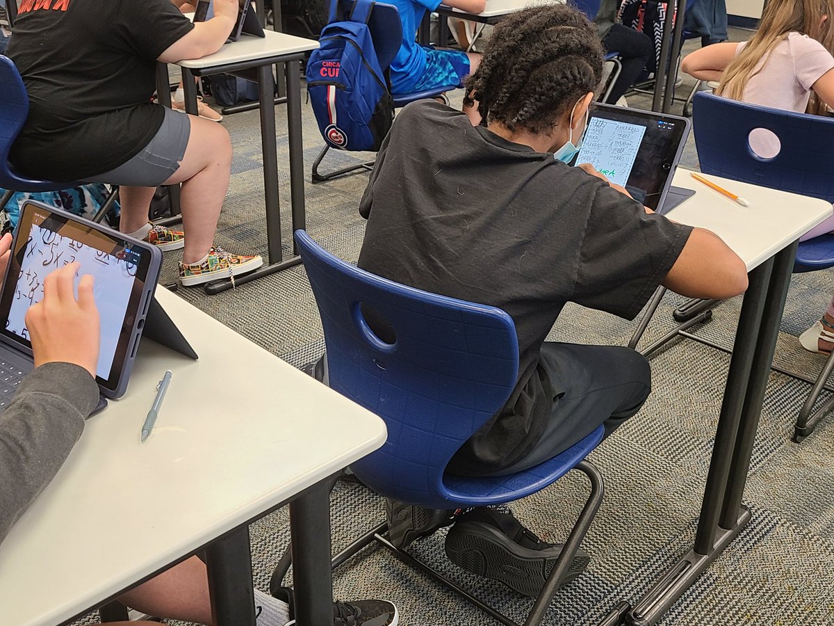 Working hard in math class to simplify expressions and learning to use the new iPad tools at the same time! #everyonecancreate #gcscpride #GCInnovator <a href="/loriannkatz/">Dr. Lori A. Katz</a> <a href="/MeganCThompson/">Megan Thompson, Ed.S</a>
