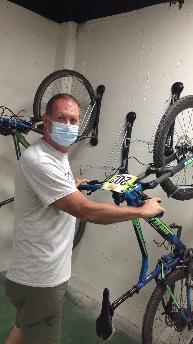 KingAthletics's tweet photo. Head @KU_Cycling coach Alan Sparks wants to get back on the track this fall as he is working in the cycling room with his mask. #MaskUpToPlay #LeadServeAchieve https://t.co/p9MvnAdLRB
