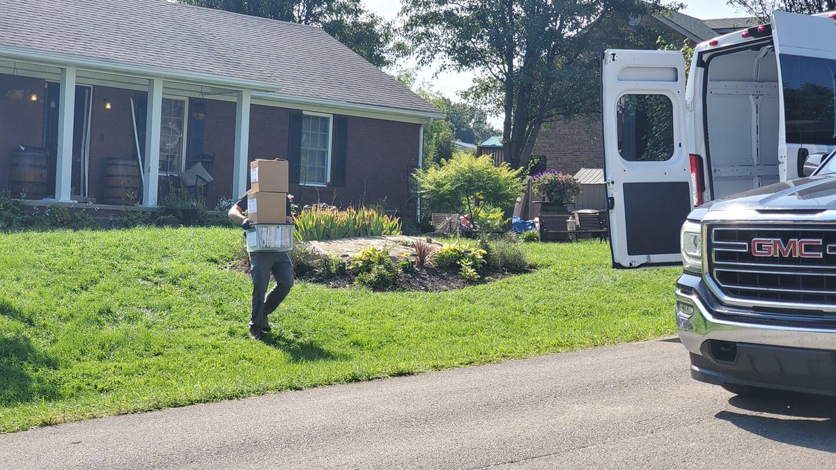 At Brooks Houck's house now. IRS taking loads of bins and file cabinets from the home. Houck is sitting with agents, hidden from view. <a href="/WHAS11/">WHAS11 News</a>
