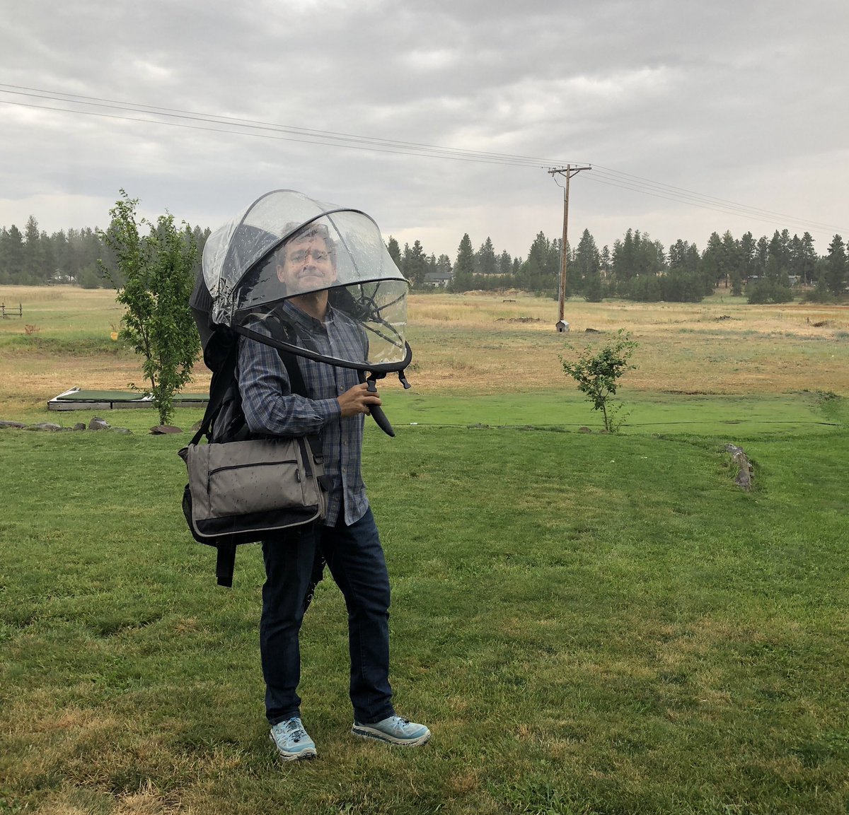 Briankxly4's tweet photo. A little rain today? #noproblem Threat of coronavirus? #stillnoproblem #nubrella #livefree #doubleprotection https://t.co/aOELZ3ukrv