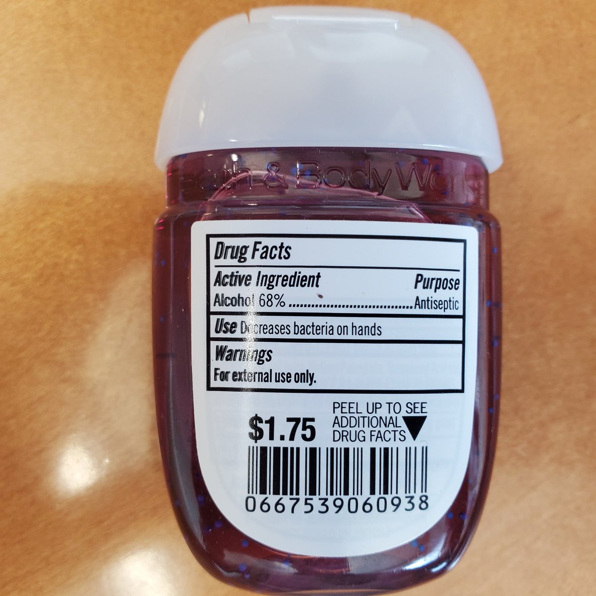 Next up we've got "Black Cherry Merlot." It tastes like crap, and nothing like merlot. Or black cherry. But it has blue sparkles! It is 68% alcohol. Which alcohol? I have no idea. It could be ethanol. Or methanol. Or isopropanol.