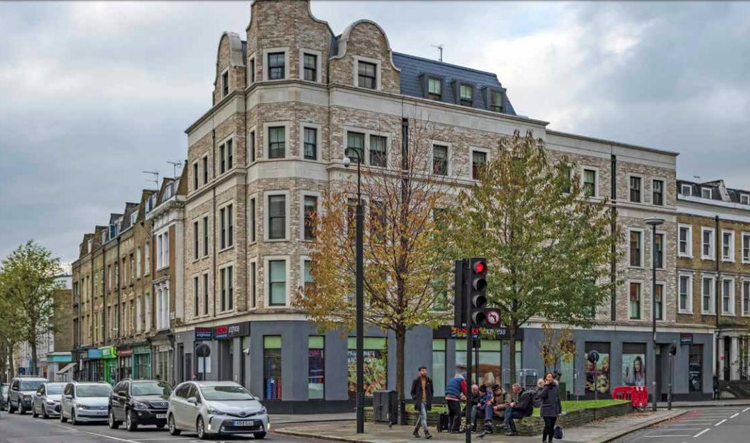 Guys, let's send a photographer out to find the best best possible example of urban housing in the country. Wait, call off the search, this one has a Tescos!