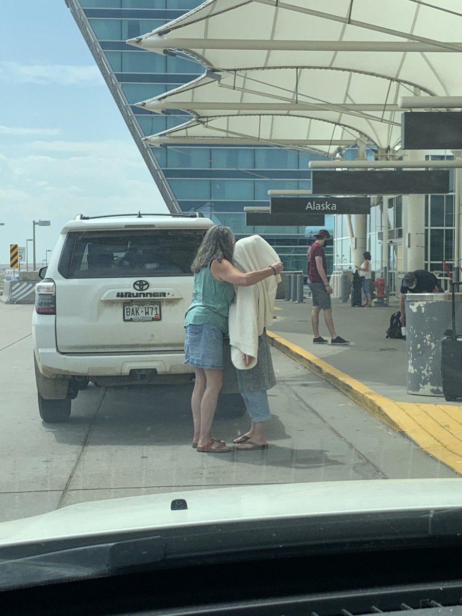 These women got out of the car at DIA sans mask, put their masks on, then one put a blanket over the other, and they embraced for 30 seconds. I’d give an ‘A’ for effort.... TBD on effectiveness. I hate this virus. #LifeIn2020