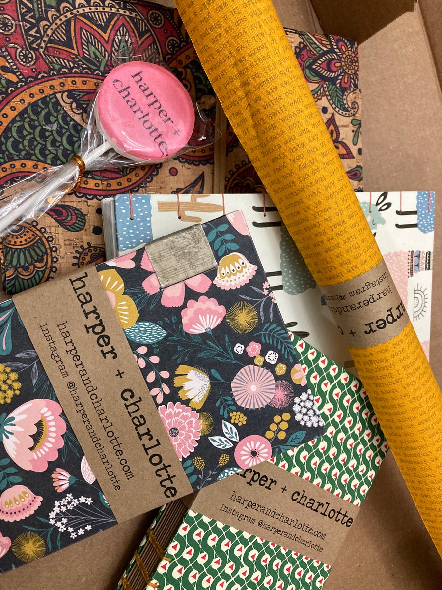 I purchased a bunch of handmade journals and a book cover from Harper & Charlotte, a Black woman owned business. I am in *love.*