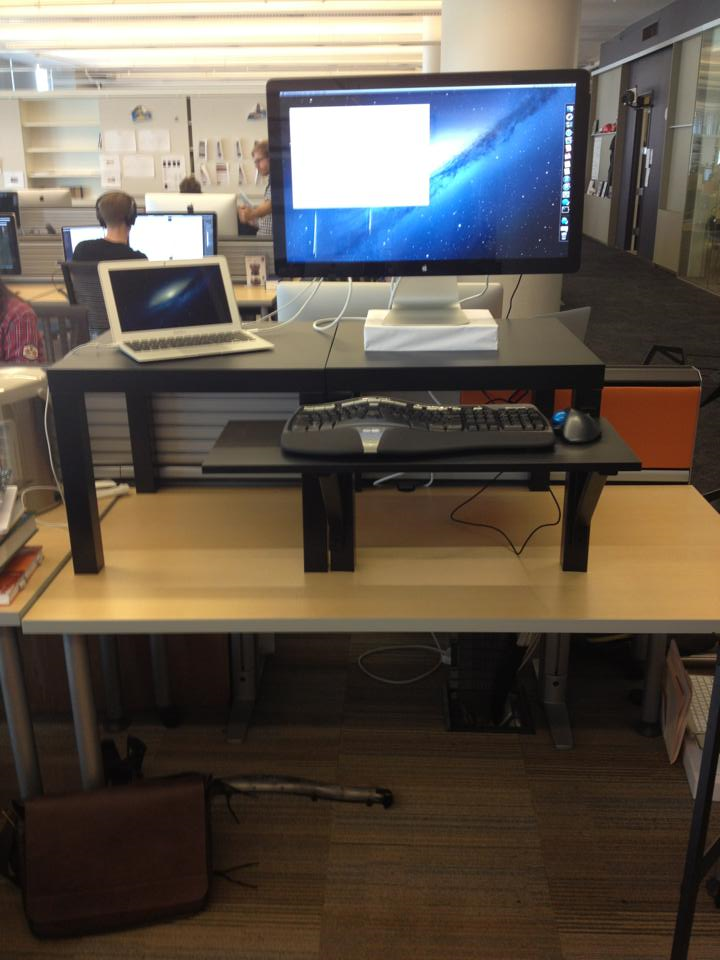 Here's a standing desk I built out of 2 Ikea side tables and a shelf, based on  @alphacolin's post:  https://alphacolin.com/ikea-standing-desk-for-22-dollars/ 6/