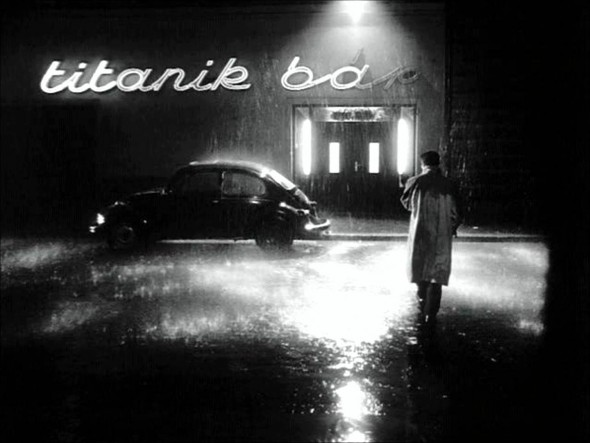 cinema neon, Damnation, titanik, man walking in rain