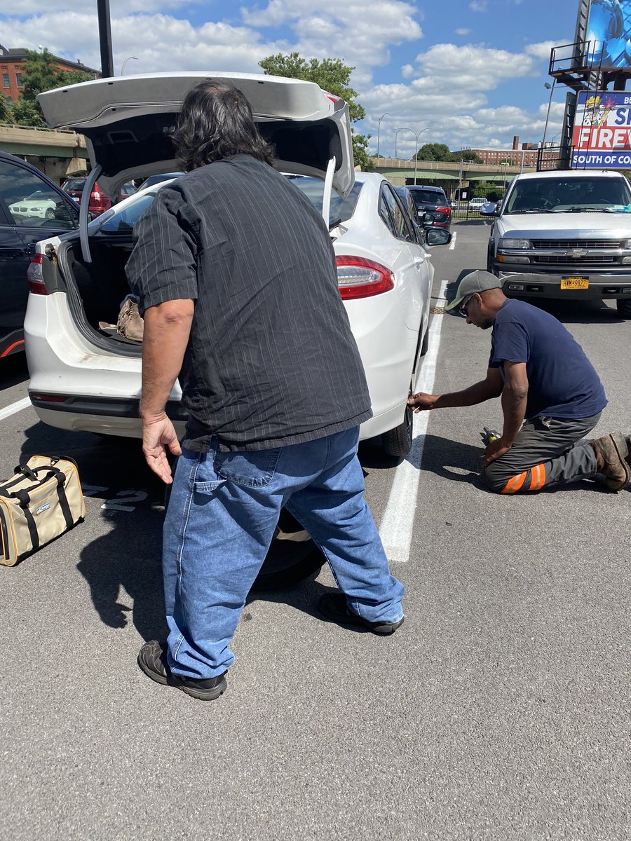 MeghanBragg's tweet photo. Shout out to these guys for changing my tire for me! But also make sure to check your spare tire too because mine was flat. 🤦🏻‍♀️ #2flats1day #itsfineeee #isitfridayyet https://t.co/O4QIHjrVdr