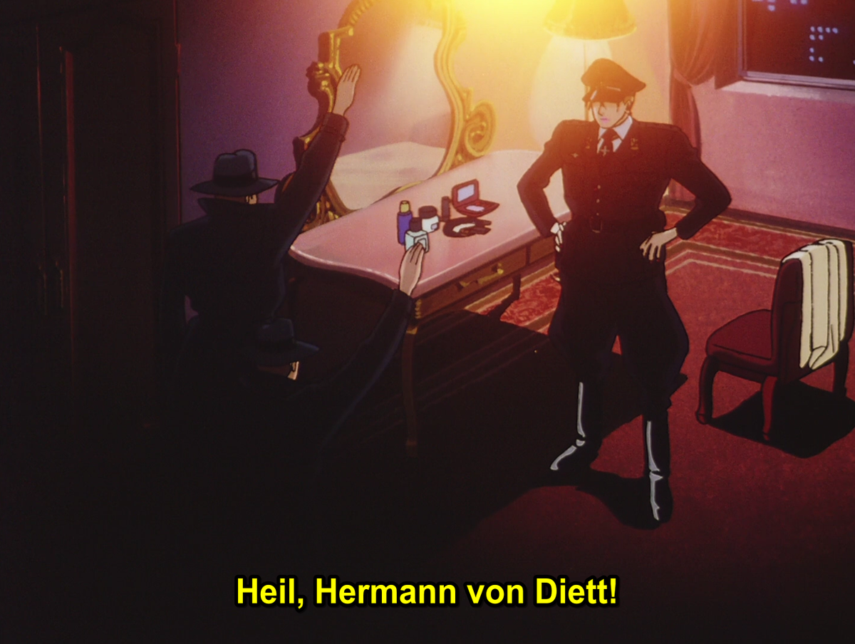 First, the main villain in this special is a homophobic, okama-type crossdressing stereotype. One who speaks with a feminine voice, wears lipstick, and doesn't like to be near women. On top of this, he is the leader of a neo-nazi cult.