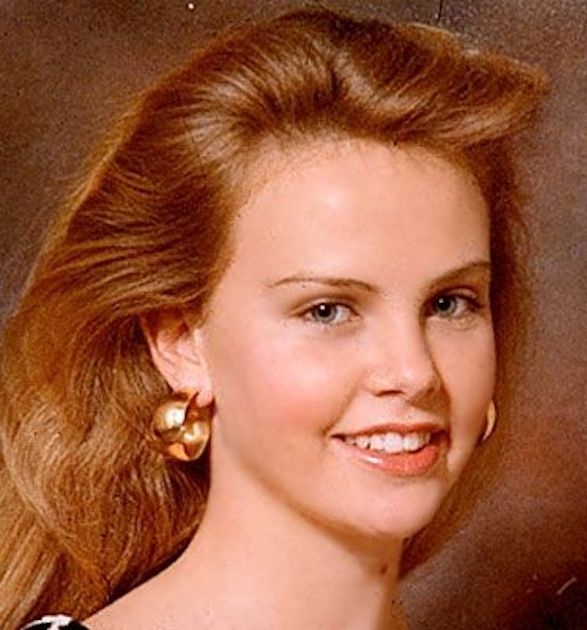 Theron creció en una granja cerca de Benoni, Sudáfrica.Es de ascendencia afrikaner (holandesa, con franceses hugonotes y alemanes).Su tío-abuelo, Danie Theron, fue una figura militar afrikaner.A los 13 años, queriendo continuar sus estudios de ballet, comenzó a asistir a