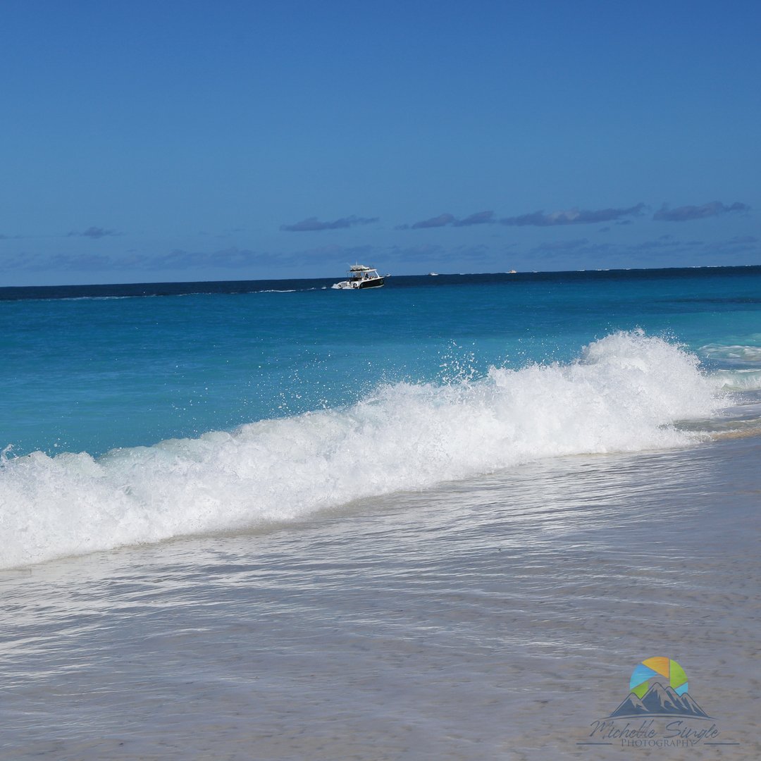 MichelleLSingle's tweet photo. No matter how much post-processing you do, you CANNOT accurately reflect the mesmerizing blue of these waters!  There are so many shades of blue here it was just unreal.  There is just blue for miles and miles.  Only the white-capped crashing waves and a boat break that up.
#phot https://t.co/xMsfEdSlqH