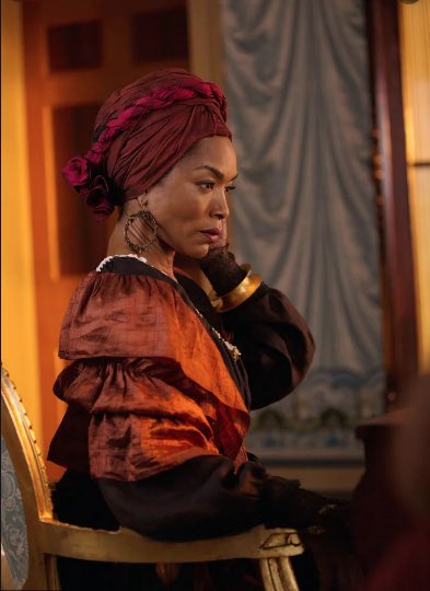 The bright reds, blues, and yellows of the scarves, and the imaginative wrapping techniques employed by their wearers, are said to have enhanced the beauty of the women of color."