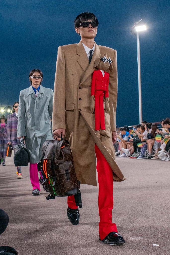 wwd's tweet photo. .@VirgilAbloh put on a playful and zany parade filled with a childlike sense of wonder for his first @LouisVuitton blended show format. https://t.co/u2slxwCps7 https://t.co/Tds4NnnEvE