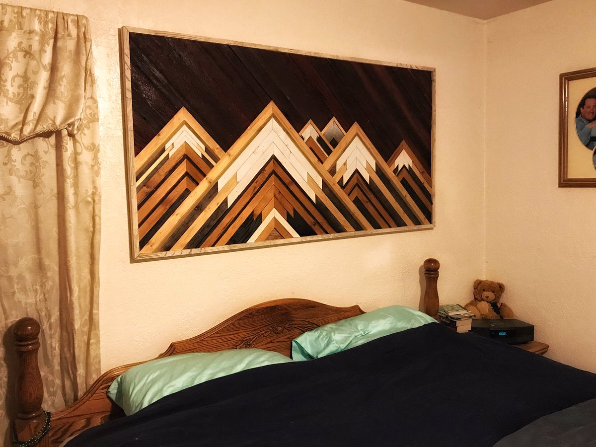 New piece is completed.  I call this one Peaks.   I’m pretty pleased.  #woodwork #carpentrywork #mosaic #upcycle #art #tetons #wyoming #palletwood #lander