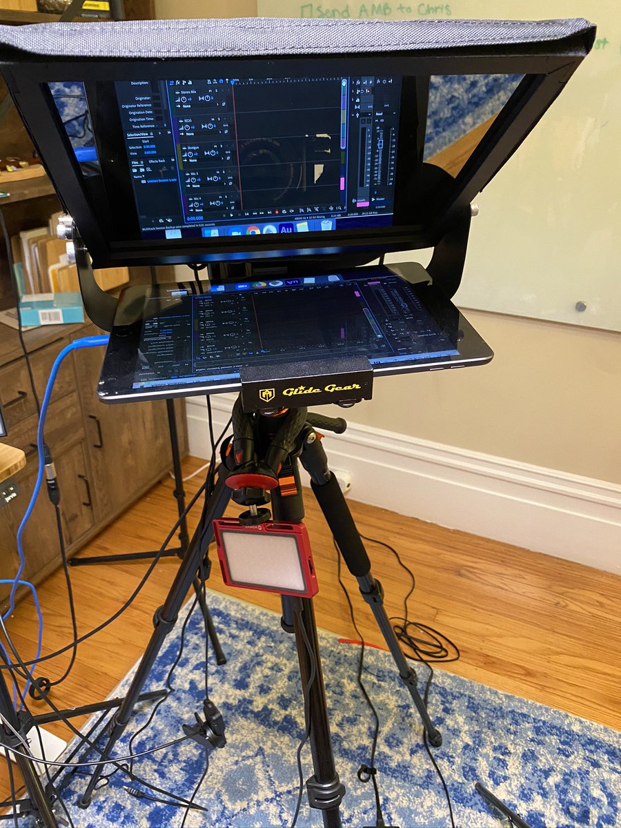 This is my teleprompter rig--a metal and glass enclosure. I use it for Zoom meetings. There's a Luna display dongle that mirrors the screen from my media computer to this thing. That's a dedicated cheap iPad in the holder, and the whole assembly lives on a tripod.