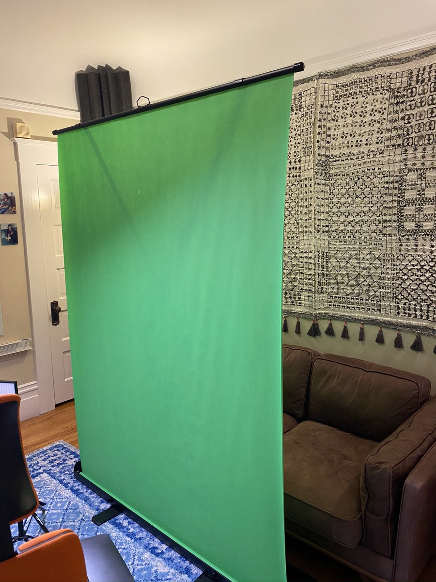 It requires I move the lights and tripod a bit, but it's a full green-screen that expands and lets me do things like "talking head superimposed over my own slides." If I were bolder I could use it for live keying with the ATEM Mini Pro.