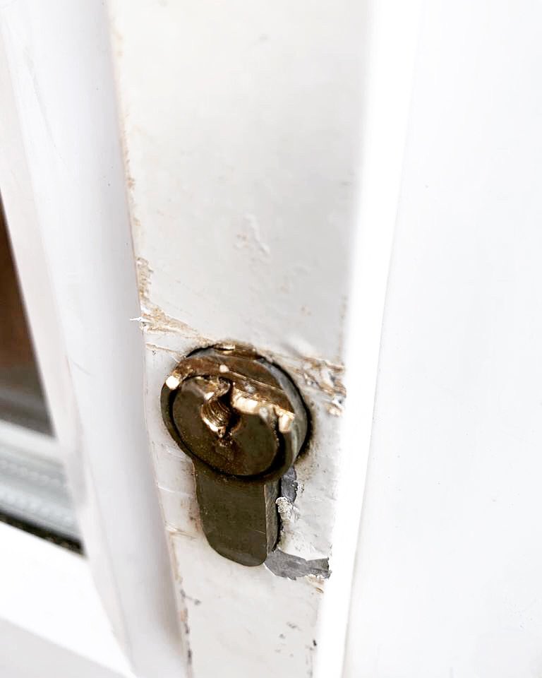 This can be the results from not calling a professional.  By the looks of it someone had attempted to hacksaw the cylinder open. 

If you need a locksmith then call the professionals, give us a call at Hames and Sons Locksmiths. 

Tel; 07713118306
hamesandsonslocksmiths.co.uk