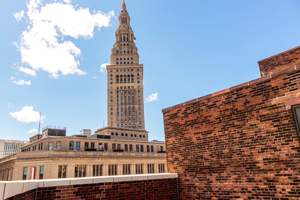The 2,000-square-foot rooftop terrace includes gas grills, fire pits, panoramic city views, and space for a planned restaurant.