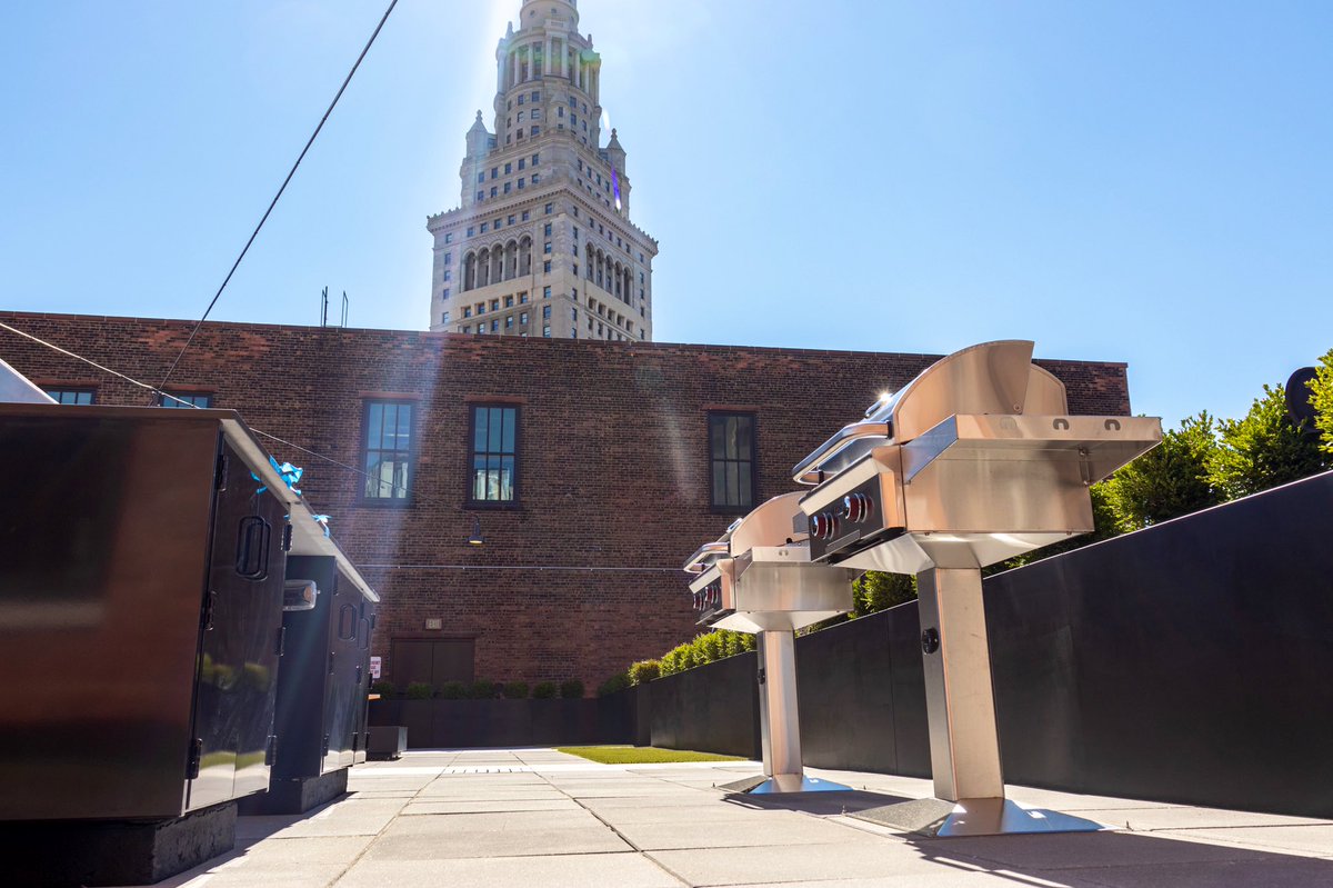The 2,000-square-foot rooftop terrace includes gas grills, fire pits, panoramic city views, and space for a planned restaurant.