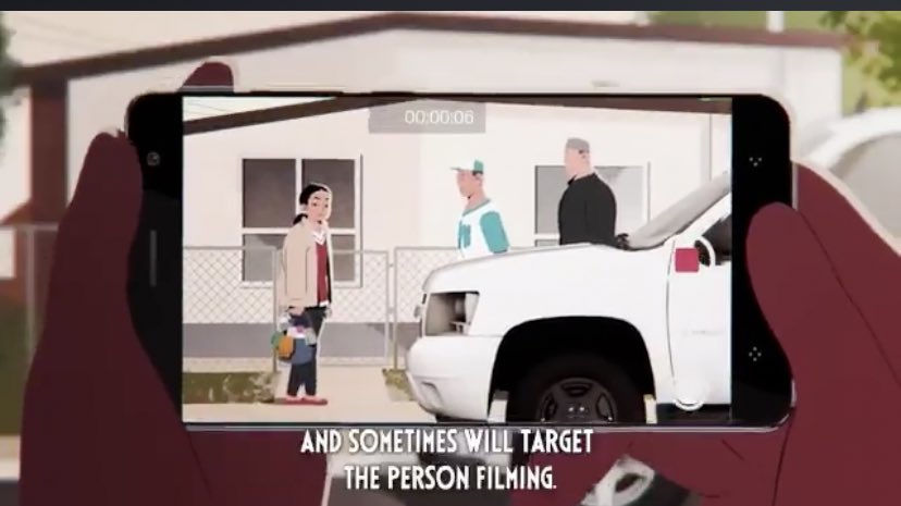 “Abdi approaches Andrea’s house. He takes out his phone & turns it so that it is horizontal not vertical. He begins filming the interaction. The agents are now speaking with Andrea. She looks back toward the house to see if anyone is watching. She locks eyes with Abdi.”