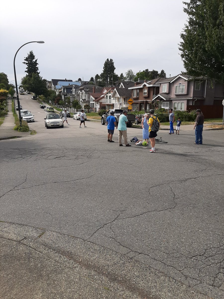 Happening right now in front of my house on Adanac bike route. Porsche runs the stop sign hits cyclist. <a href="/CityofVancouver/">City of Vancouver</a> GET RID OF THE CARS!! Looks like broken collarbone.