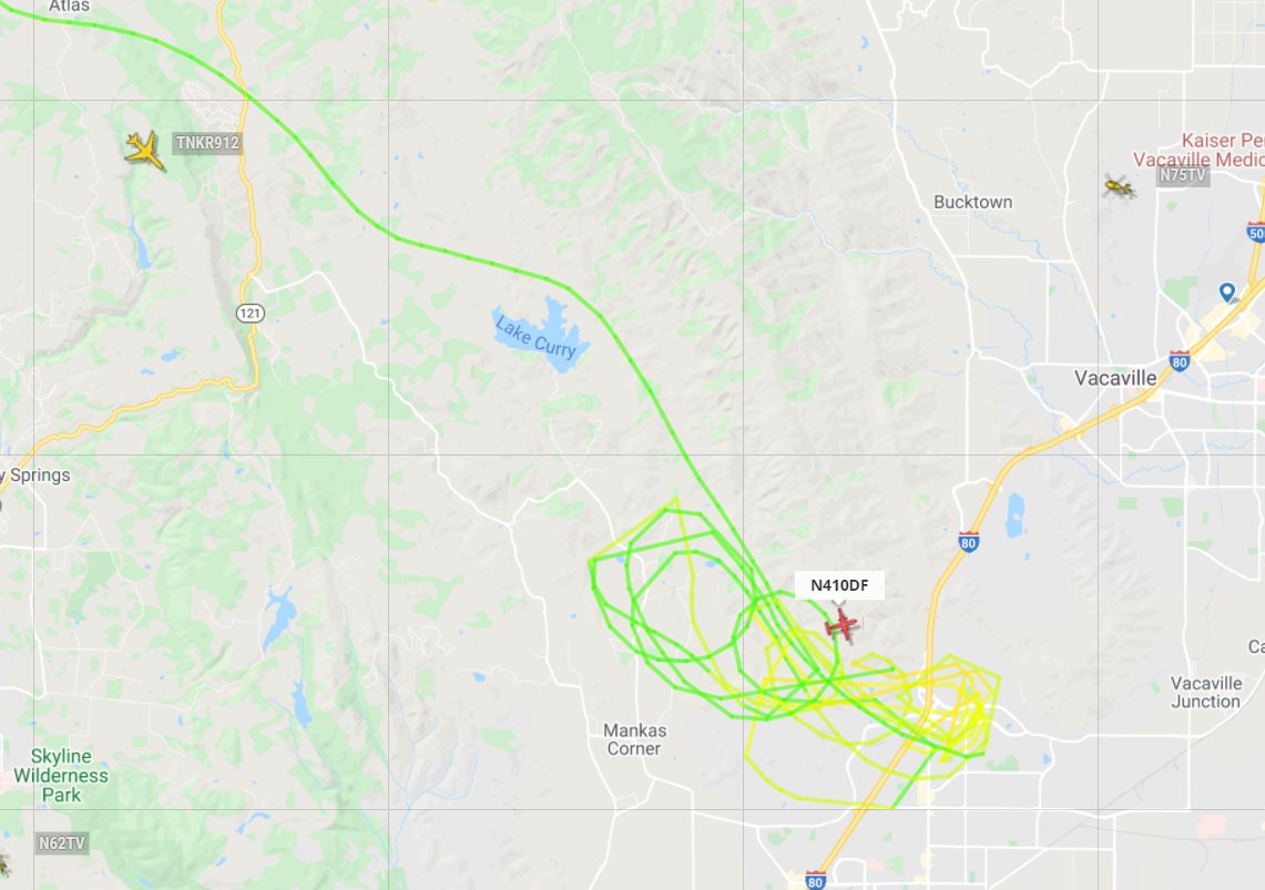 #LNULightningComplex - T912 (VLAT) coming in to drop retardant just off I-80, appears to be above the Rolling Hills neighborhood based on previous smaller tanker drops. #Vacaville #Fairfield #HennesseyFire
