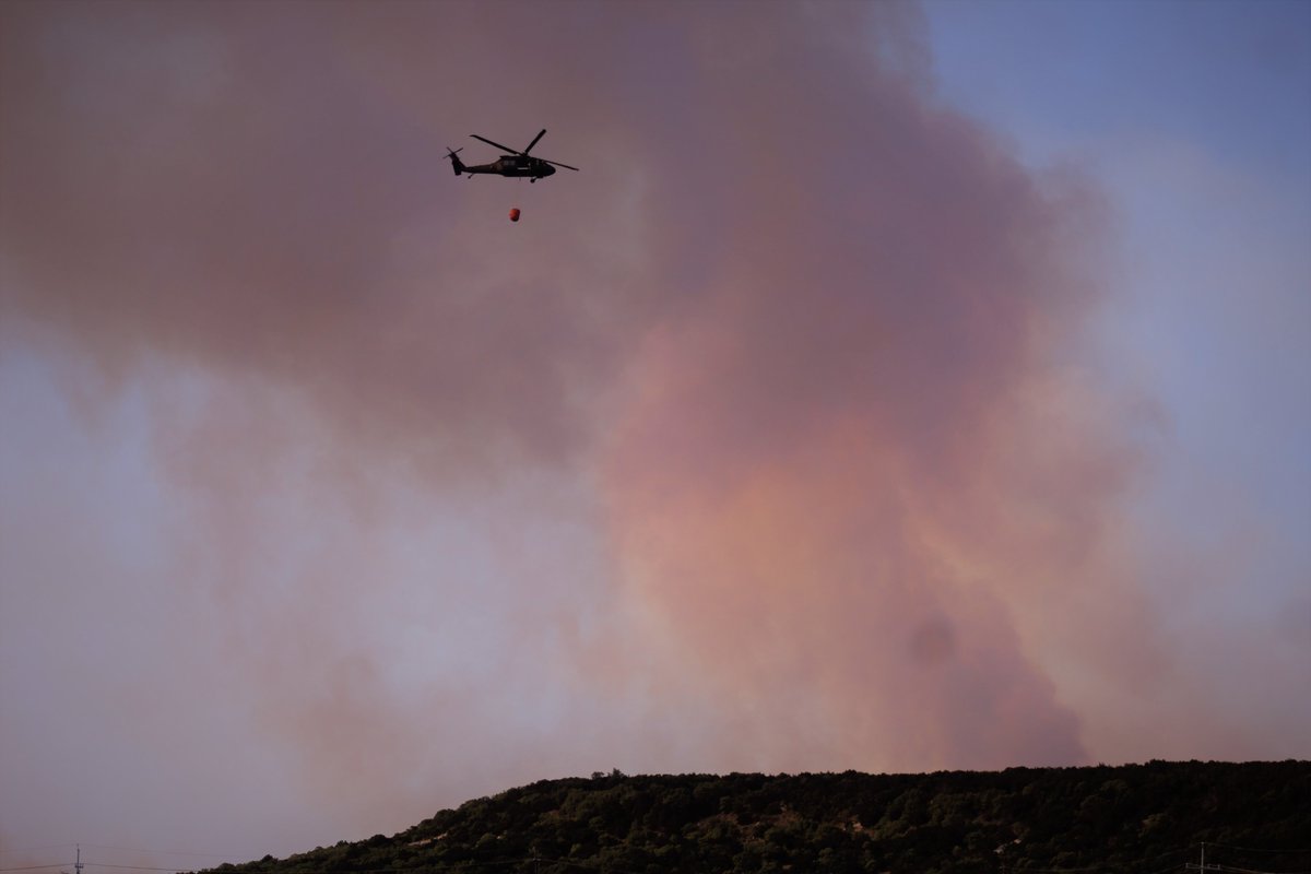 EditorSentinel's tweet photo. Today is National Aviation Day and aviators from 1st Air Cavalry Brigade are fighting fires with a Bambi Bucket. #ArmyAviation @forthood @1stCavalryDiv https://t.co/eBQtQ1GRgU