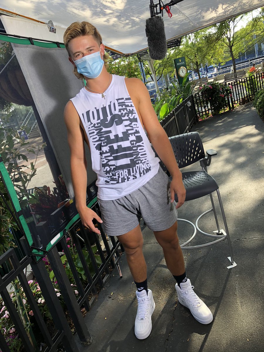 BlairHenley's tweet photo. Honestly thought I saw the best tennis look of the day when I glimpsed Milos Raonic’s hair in person. 

Then Cincinnati’s own JJ Wolf showed up for press and, well, see for yourself. 

#CInCyTENNIS https://t.co/5qwk9IjXd1