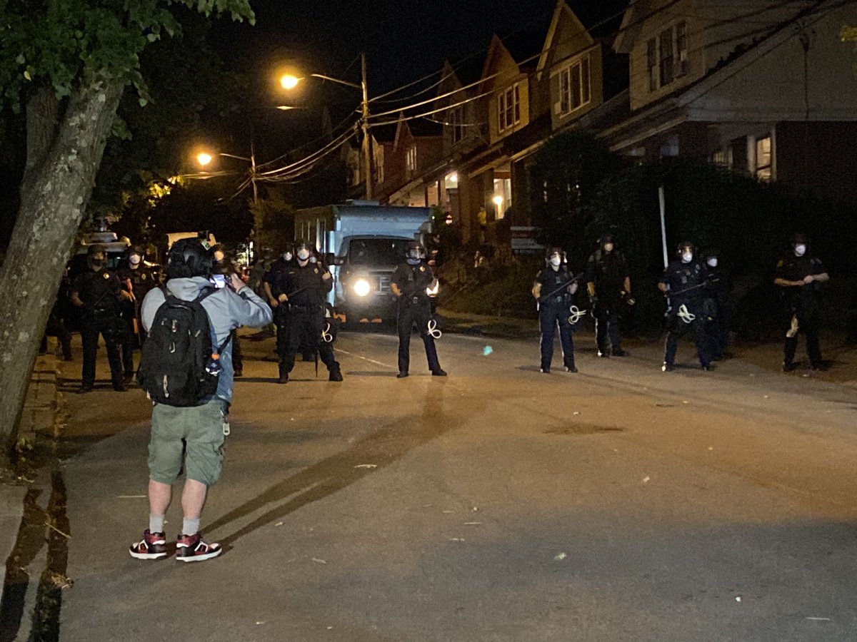 Official declaration of unlawful assembly. Officers describe ways people can leave and give people two minutes to leave.