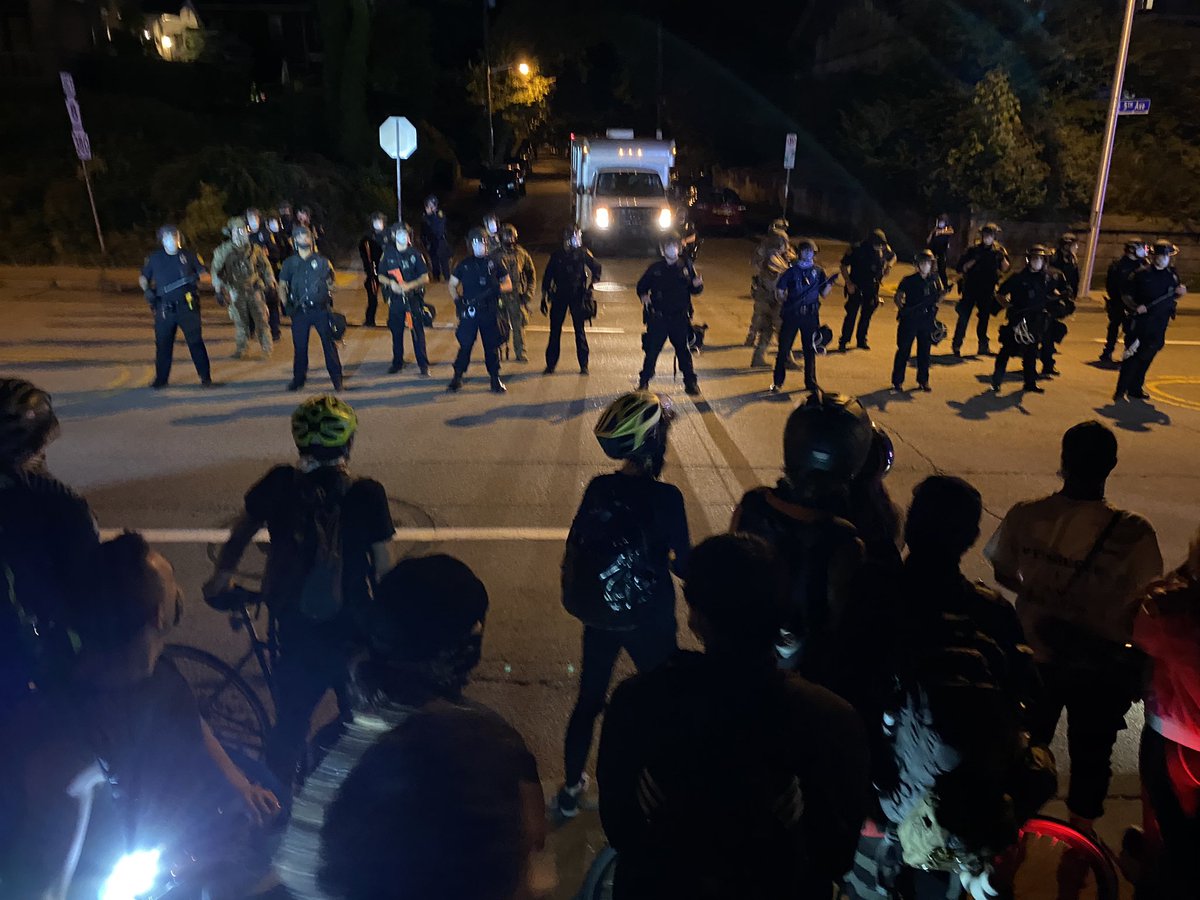 Cops currently have everyone on the sidewalk or in the park.