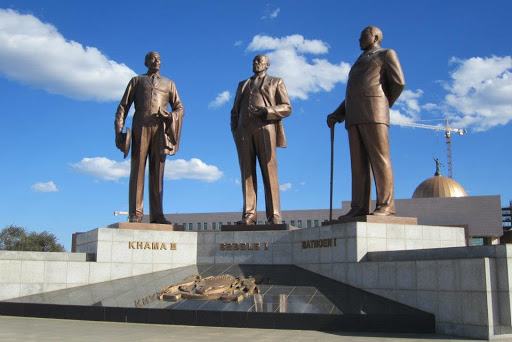 We're visiting the capital of Botswana tonight to see the Three Dikgosi Monument. It has three 18 ft tall (5.4 meters) bronze statues of three dikgosi (chiefs) who were important to the independence of Botswana.